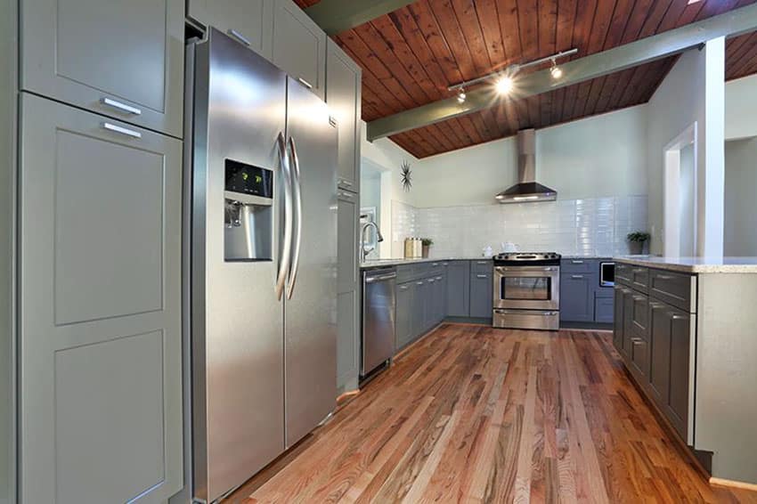 Contemporary slopped ceiling kitchen with white oak floors